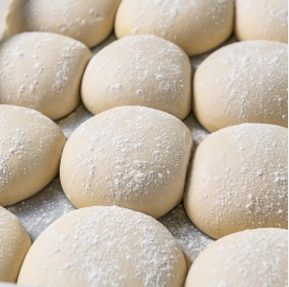 Individually portioned pizza dough balls for foodservice distribution
